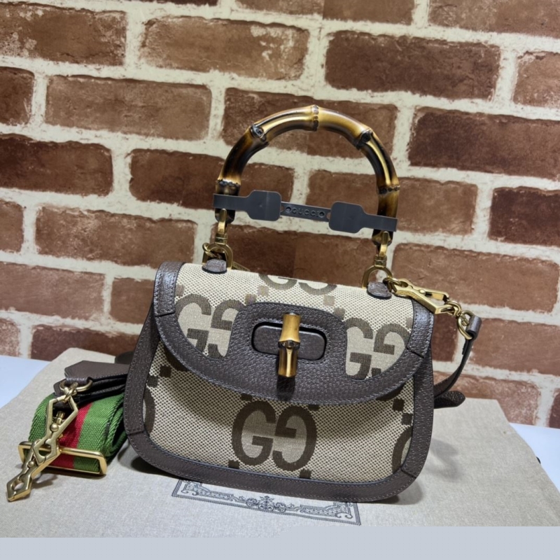 G*u*i top handle bags